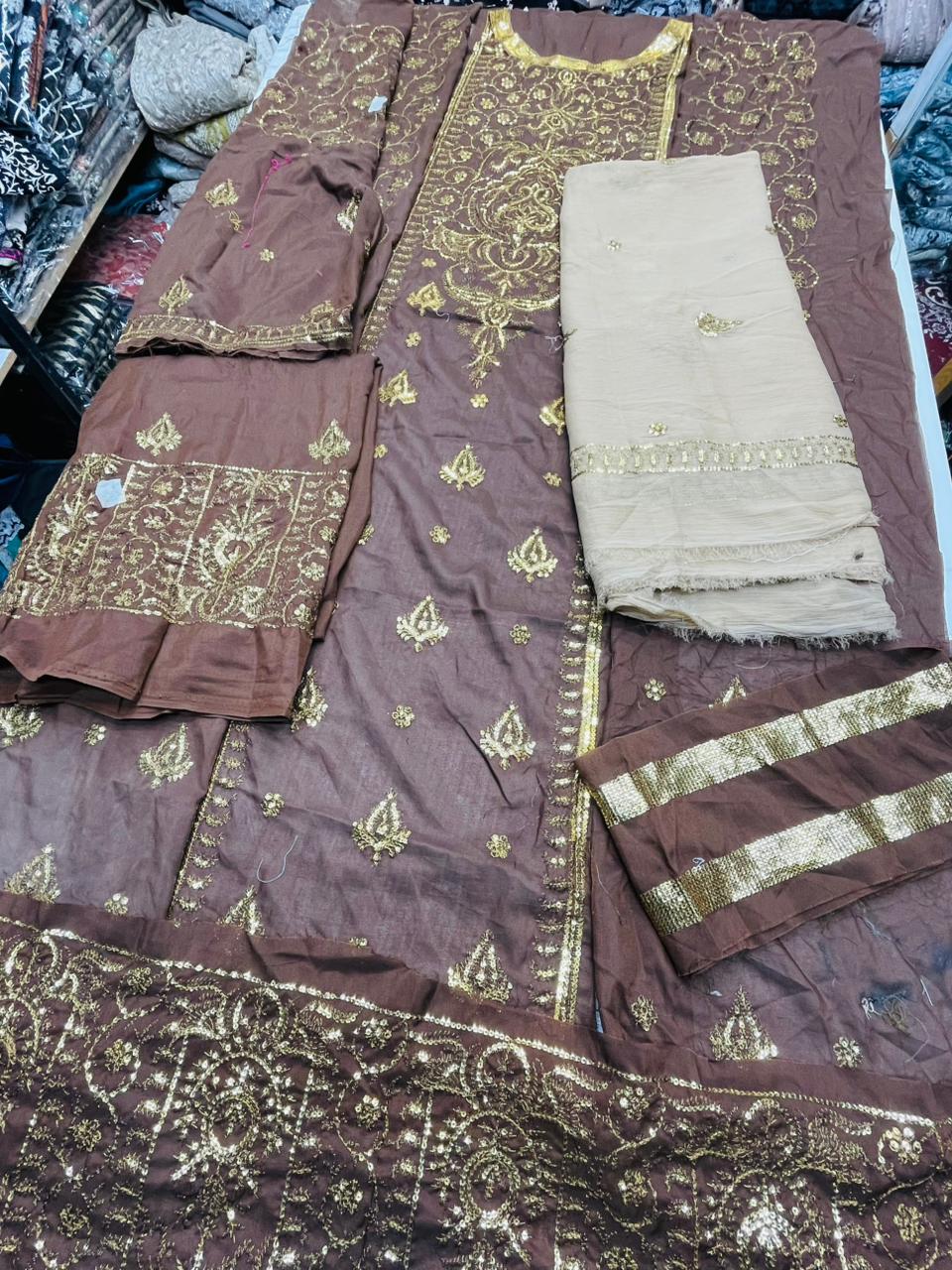 Embroidered center panel on twisted silk