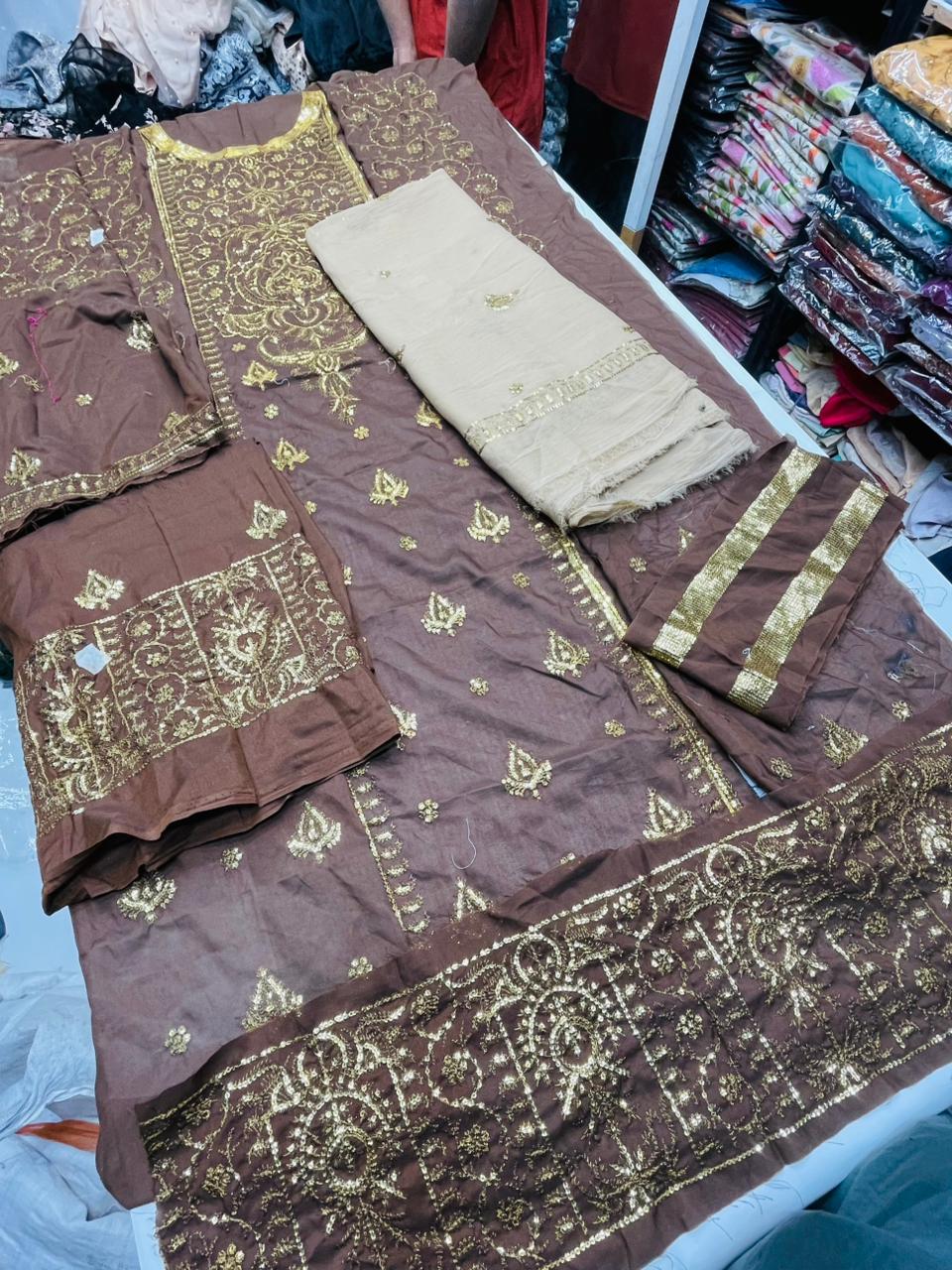 Embroidered center panel on twisted silk