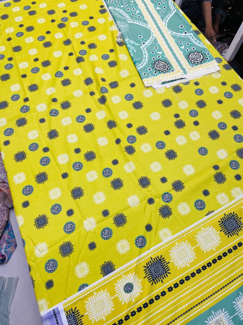 Vibrant Yellow Printed Unstitched 2-Piece Suit code 031